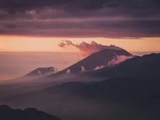 A beautiful landscape with a lake and mountains 1